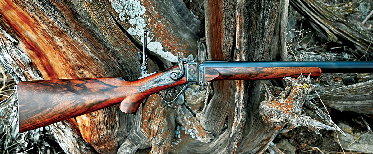 The Model 1877 Sharps rifle by Shiloh Rifle Manufacturing Company. A superbly built rifle, stocked in an exceptional piece of Turkish walnut and engraved by Master Engraver Suzi Bradley.
